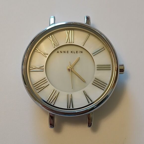Anne Klein Women's Roman Numeral MOP Dial Silver Tone Round Watch Case WR 100FT - Picture 1 of 11
